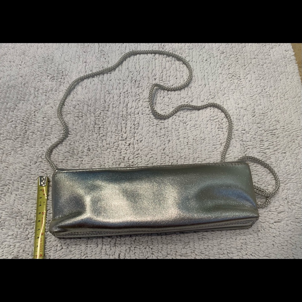 La Regale silver evening bag with strap